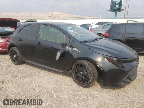 2019 Toyota Corolla Hatchback SE with VIN JTNK4RBE5K3063487, listed as a Copart auction lot 69667404 with 92,050 mi miles and Salvage Title. Bid and sale history available at carsss.com. Image 4.