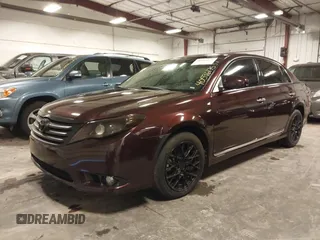 2011 Toyota Avalon with VIN 4T1BK3DB4BU433408, listed as a IAAI auction lot 40596175 with 123,529 mi miles and . Bid and sale history available at carsss.com. Image 21.