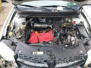 2014 Dodge Avenger SE with VIN 1C3CDZAB0EN148086, listed as a IAAI auction lot 42234364 with 200,650 mi miles and . Bid and sale history available at DreamBid. Image 10.