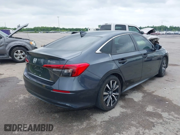 2023 Honda Civic EX with VIN 2HGFE1F73PH312228, listed as a IAAI auction lot 42185408 with 19,339 mi miles and . Bid and sale history available at DreamBid. Image 4.