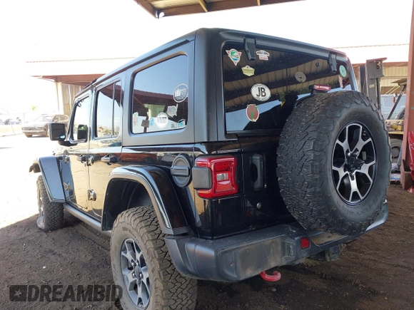 2019 Jeep Wrangler Unlimited Rubicon with VIN 1C4HJXFN5KW522991, listed as a IAAI auction lot 42609616 with 111,844 mi miles and . Bid and sale history available at DreamBid. Image 3.
