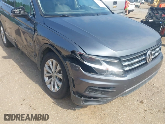 2018 Volkswagen Tiguan SEL z VIN 3VV3B7AX1JM045203, wystawiony jako IAAI lot #42572229 z przebiegiem 104 873 mil mil oraz . Historia ofert i sprzedaży dostępna na DreamBid. Obrazek 17.