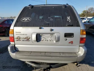 1998 Isuzu Rodeo S with VIN 4S2CM58W7W4323393, listed as a Copart auction lot 77571224 with 261,881 mi miles and Clean Title. Bid and sale history available at carsss.com. Image 6.