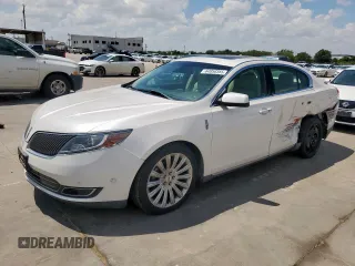 2013 Lincoln MKS with VIN 1LNHL9DK6DG616711, listed as a Copart auction lot 64950355 with 88,370 mi miles and Salvage title. Bid and sale history available at DreamBid. Image 1.
