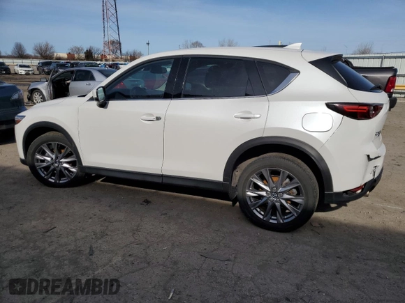 2020 Mazda CX-5 Grand Touring with VIN JM3KFBDM0L1810699, listed as a Copart auction lot 47846215 with 61,441 mi miles and Salvage Title. Bid and sale history available at carsss.com. Image 2.