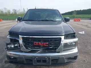 2010 GMC Canyon SLE1 z VIN 1GTJTCDEXA8109443, wystawiony jako IAAI lot #42240716 z przebiegiem 160 500 mil mil oraz . Historia ofert i sprzedaży dostępna na DreamBid. Obrazek 13.