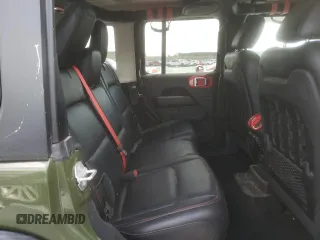 2020 Jeep Wrangler Unlimited Rubicon z VIN 1C4HJXFN9LW315814, wystawiony jako Copart lot #49147855 z przebiegiem 28 902 mil mil oraz Szkoda całkowita • Salvage title. Historia ofert i sprzedaży dostępna na DreamBid. Obrazek 11.