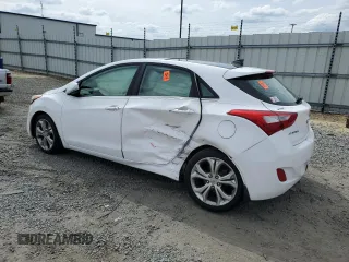 2013 Hyundai Elantra GT with VIN KMHD35LE0DU121960, listed as a Copart auction lot 71340194 with 148,280 mi miles and Salvage Title. Bid and sale history available at carsss.com. Image 2.