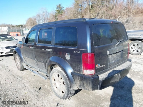 2011 Dodge Nitro Heat with VIN 1D4PU4GK1BW522673, listed as a IAAI auction lot 41448169 with 174,827 mi miles. Bid and sale history available at carsss.com. Image 3.