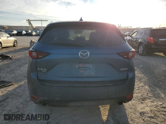 2020 Mazda CX-5 Touring with VIN JM3KFBCM9L0737243, listed as a Copart auction lot 46908495 with 76,956 mi miles and Salvage Title. Bid and sale history available at carsss.com. Image 6.