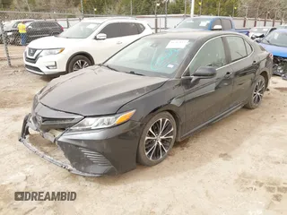 2019 Toyota Camry LE z VIN 4T1B11HK6KU805252, wystawiony jako IAAI lot #41787833 z przebiegiem 85 196 mil mil oraz . Historia ofert i sprzedaży dostępna na DreamBid. Obrazek 18.