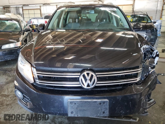 2013 Volkswagen Tiguan SE z VIN WVGBV7AX9DW529234, wystawiony jako Copart lot #41610635 z przebiegiem 130 566 mil mil oraz Szkoda całkowita • Salvage title. Historia ofert i sprzedaży dostępna na DreamBid. Obrazek 5.