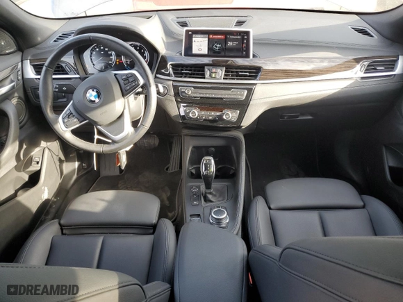 2021 BMW X2 xDrive28i with VIN WBXYJ1C07M5S21169, listed as a Copart auction lot 77829574 with 24,173 mi miles and Salvage Title. Bid and sale history available at carsss.com. Image 8.