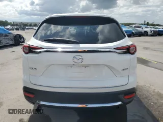2021 Mazda CX-9 Grand Touring with VIN JM3TCADY7M0501717, listed as a Copart auction lot 59402875 with 53,218 mi miles and Salvage title. Bid and sale history available at DreamBid. Image 6.
