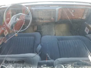 1992 Cadillac Brougham z VIN 1G6DW54E9NR713312, wystawiony jako Copart lot #71659794 z przebiegiem 41 467 mil mil oraz Tytuł czysty. Historia ofert i sprzedaży dostępna na DreamBid. Obrazek 8.