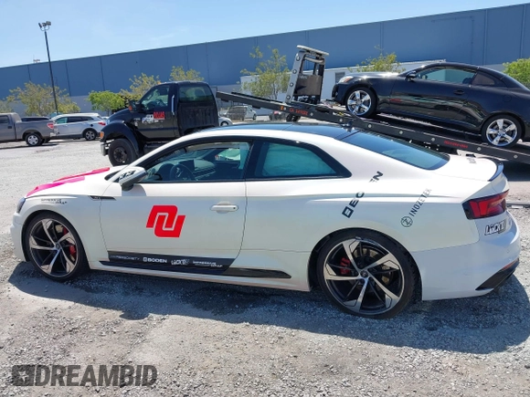 2018 Audi RS 5 z VIN WUAPWAF55JA903152, wystawiony jako IAAI lot #42193996 z przebiegiem 95 730 mil mil oraz . Historia ofert i sprzedaży dostępna na DreamBid. Obrazek 14.
