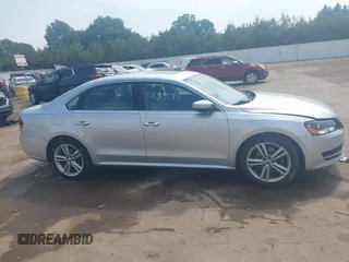 2014 Volkswagen Passat SE with VIN 1VWBT7A37EC039074, listed as a IAAI auction lot 42439583 with 109,654 mi miles and . Bid and sale history available at DreamBid. Image 14.