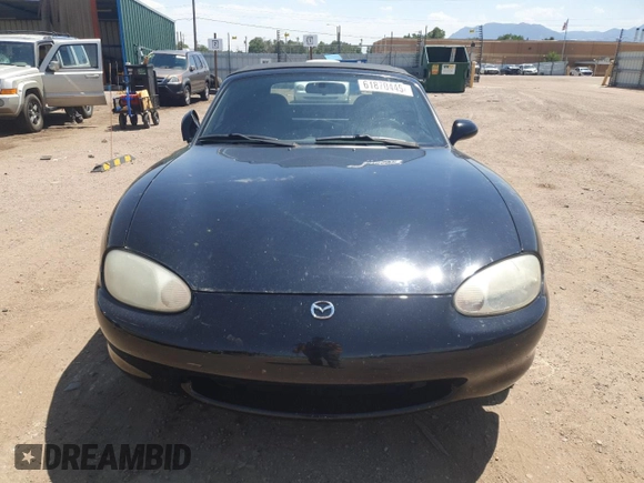 1999 Mazda MX-5 Miata with VIN JM1NB3535X0119662, listed as a Copart auction lot 61870445 with 84,787 mi miles and Clean title. Bid and sale history available at DreamBid. Image 5.