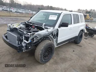 2016 Jeep Patriot Sport SE with VIN 1C4NJPBA5GD700309, listed as a IAAI auction lot 41673265 with 123,977 mi miles and . Bid and sale history available at DreamBid. Image 2.