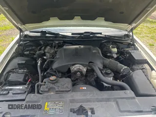 2000 Mercury Grand Marquis GS z VIN 2MEFM74W2YX675365, wystawiony jako Copart lot #58024375 z przebiegiem 35 499 mil mil oraz Czysty tytuł • Clean title. Historia ofert i sprzedaży dostępna na DreamBid. Obrazek 7.