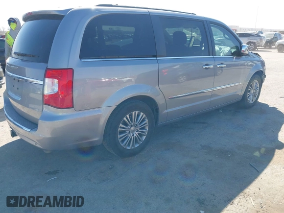 2014 Chrysler Town & Country Touring-L with VIN 2C4RC1CG7ER234517, listed as a IAAI auction lot 41824484 with 190,245 mi miles. Bid and sale history available at carsss.com. Image 4.