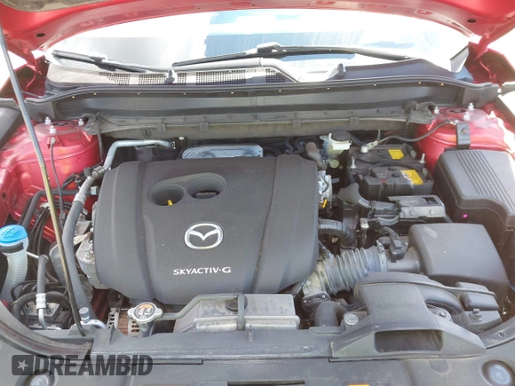 2021 Mazda CX-5 Touring z VIN JM3KFBCM1M0401717, wystawiony jako IAAI lot #42036407 z przebiegiem 35 587 mil mil oraz . Historia ofert i sprzedaży dostępna na DreamBid. Obrazek 10.