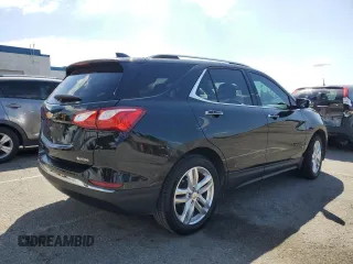 2018 Chevrolet Equinox Premier with VIN 2GNAXMEV7J6157052, listed as a Copart auction lot 51359965 with 145,382 mi miles and Salvage Title. Bid and sale history available at carsss.com. Image 3.