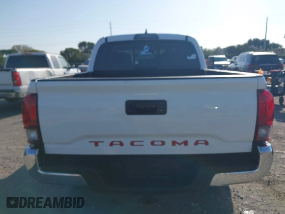 2018 Toyota Tacoma SR with VIN 5TFAX5GN2JX128621, listed as a IAAI auction lot 41797514 with 216,251 mi miles and . Bid and sale history available at DreamBid. Image 16.