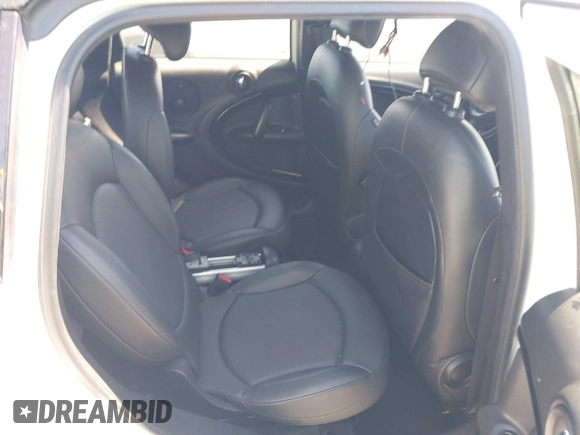 2012 MINI Countryman S with VIN WMWZC5C54CWM11869, listed as a IAAI auction lot 42265935 with 100,102 mi miles and . Bid and sale history available at DreamBid. Image 8.