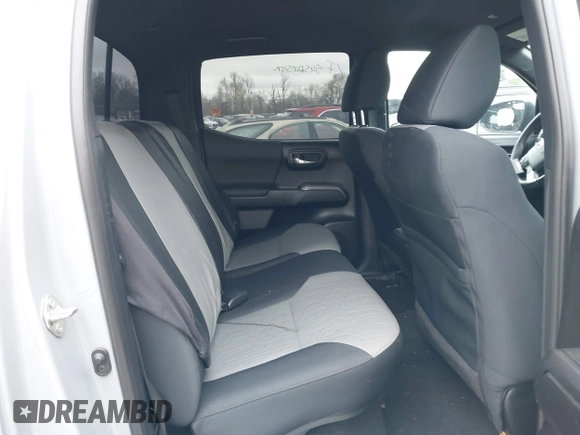 2021 Toyota Tacoma SR z VIN 3TMCZ5AN5MM372821, wystawiony jako IAAI lot #41886586 z przebiegiem 68 878 mil mil oraz . Historia ofert i sprzedaży dostępna na DreamBid. Obrazek 8.
