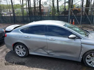 2015 Chrysler 200 Limited with VIN 1C3CCCAB9FN553199, listed as a IAAI auction lot 41988732 with 136,992 mi miles and . Bid and sale history available at DreamBid. Image 6.