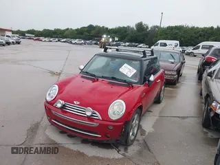 2005 MINI Hardtop with VIN WMWRC33415TJ67372, listed as a IAAI auction lot 42120875 with 153,727 mi miles and . Bid and sale history available at DreamBid. Image 2.