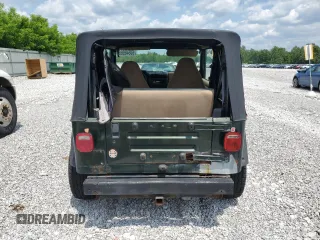 1998 Jeep Wrangler Sahara с VIN 1J4FY49S0WP727745, выставлен на аукционе Copart как лот 60546955 с пробегом 139 476 миль миль и Чистый • Clean title. История ставок и продаж доступна на DreamBid. Изображение 6.