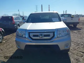 2009 Honda Pilot EX with VIN 5FNYF48479B002570, listed as a IAAI auction lot 41703942 with 146,405 mi miles. Bid and sale history available at carsss.com. Image 12.