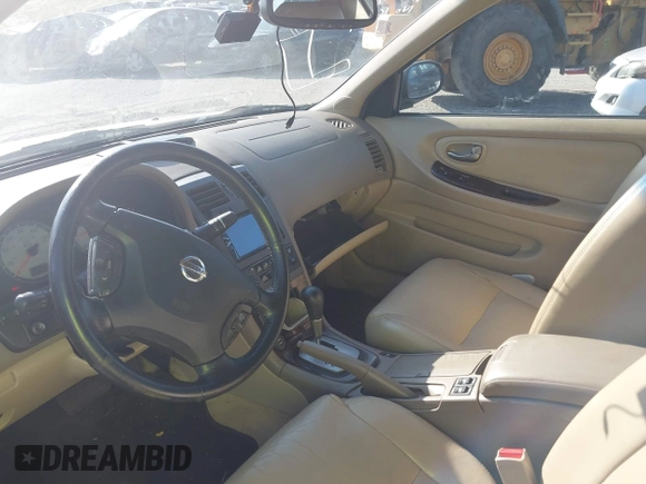 2003 Nissan Maxima SE z VIN JN1DA31D33T510169, wystawiony jako IAAI lot #42339254 z przebiegiem 182 862 mil mil oraz . Historia ofert i sprzedaży dostępna na DreamBid. Obrazek 5.