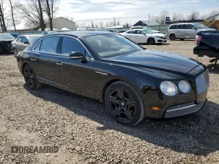 2014 Bentley Flying Spur with VIN SCBEC9ZA7EC095064, listed as a Copart auction lot 52218105 with 24,143 mi miles and Salvage title. Bid and sale history available at DreamBid. Image 4.