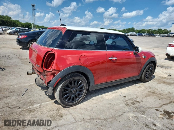 2015 MINI Hardtop with VIN WMWXM5C59FT939742, listed as a Copart auction lot 63778555 with 110,428 mi miles and Salvage title. Bid and sale history available at DreamBid. Image 3.