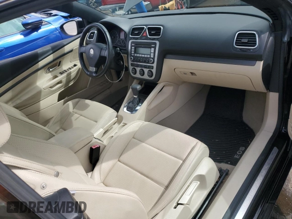 2009 Volkswagen Eos Komfort с VIN WVWBA71F19V006813, выставлен на аукционе Copart как лот 51868645 с пробегом 79 038 миль миль и Чистый • Clean title. История ставок и продаж доступна на DreamBid. Изображение 8.