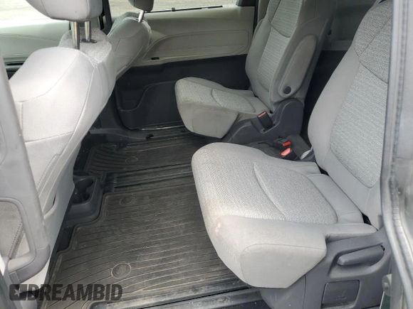 2021 Toyota Sienna LE with VIN 5TDBSKFC4MS027897, listed as a Copart auction lot 56052375 with 66,604 mi miles and Salvage title. Bid and sale history available at DreamBid. Image 11.