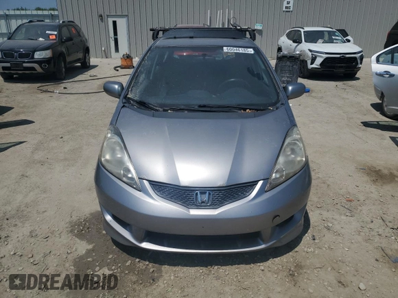 2009 Honda Fit Sport with VIN JHMGE88449S012139, listed as a Copart auction lot 60046185 with 255,292 mi miles and Clean title. Bid and sale history available at DreamBid. Image 5.