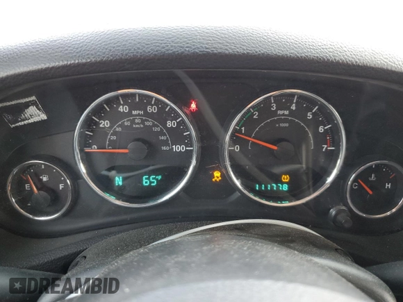 2013 Jeep Wrangler Sport z VIN 1C4AJWAG5DL671491, wystawiony jako Copart lot #59306745 z przebiegiem 111 778 mil mil oraz Szkoda całkowita • Salvage title. Historia ofert i sprzedaży dostępna na DreamBid. Obrazek 9.