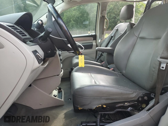 2012 Volkswagen Routan SE with VIN 2C4RVABGXCR391550, listed as a Copart auction lot 62004685 with 77,643 mi miles and Salvage title. Bid and sale history available at DreamBid. Image 7.