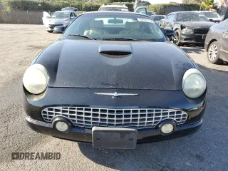 2004 Ford Thunderbird Deluxe with VIN 1FAHP60AX4Y104244, listed as a Copart auction lot 84561114 with 79,379 mi miles and Clean Title. Bid and sale history available at DreamBid. Image 5.