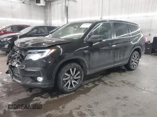 2021 Honda Pilot EX-L with VIN 5FNYF6H50MB092898, listed as a IAAI auction lot 41530673 with 28,505 mi miles. Bid and sale history available at carsss.com. Image 2.