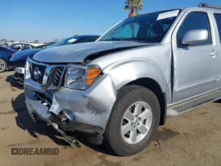 2012 Nissan Pathfinder S z VIN 5N1AR1NN8CC619075, wystawiony jako IAAI lot #42227462 z przebiegiem 93 991 mil mil oraz . Historia ofert i sprzedaży dostępna na DreamBid. Obrazek 6.