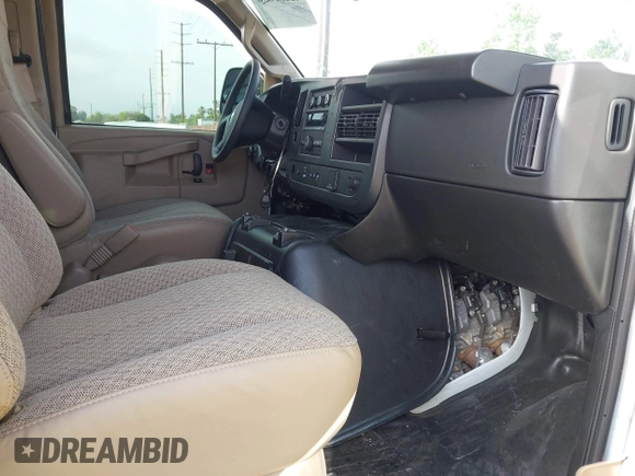 2024 Chevrolet Express Cargo with VIN 1GCWGAFP2R1279801, listed as a IAAI auction lot 42235836 with 11,611 mi miles and . Bid and sale history available at DreamBid. Image 5.