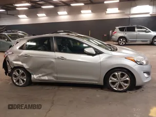 2013 Hyundai Elantra GT with VIN KMHD35LE2DU105677, listed as a IAAI auction lot 42027623 with 137,063 mi miles. Bid and sale history available at carsss.com. Image 13.