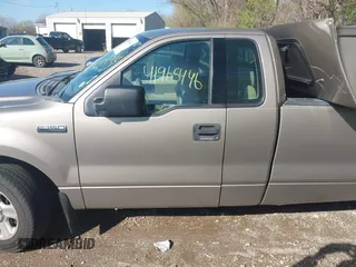 2004 Ford F-150 XL with VIN 1FTRF12W94NA93705, listed as a IAAI auction lot 41965446 with 209,097 mi miles. Bid and sale history available at carsss.com. Image 14.