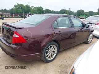 2012 Ford Fusion SEL with VIN 3FAHP0JA1CR144317, listed as a IAAI auction lot 42597920 with 124,277 mi miles and . Bid and sale history available at DreamBid. Image 4.