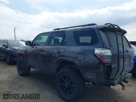 2015 Toyota 4Runner SR5 with VIN JTEZU5JRXF5091016, listed as a IAAI auction lot 41592829 with 196,988 mi miles and . Bid and sale history available at DreamBid. Image 14.